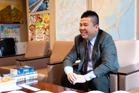 Section Chief Saeki explaining his background